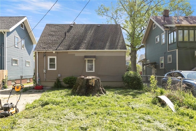 4414 W 171st St, Cleveland, OH 44135 - rear view of property with fence and roof with shingles