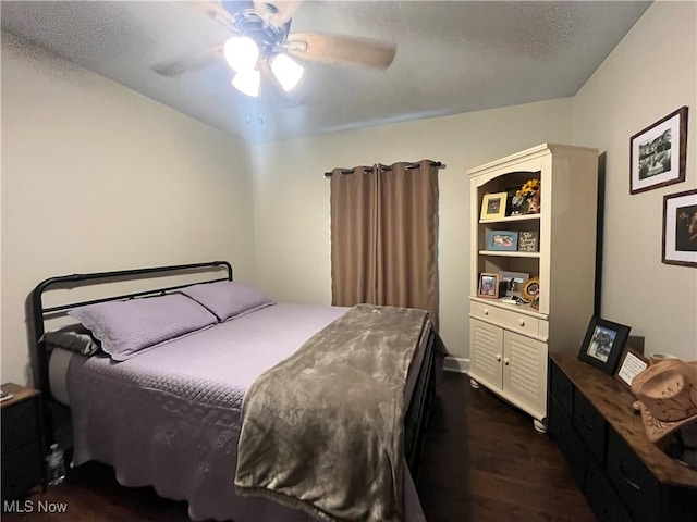 9355 Dozer Ridge Rd, Blue Rock, OH 43720 - bedroom featuring dark wood-style flooring and ceiling fan