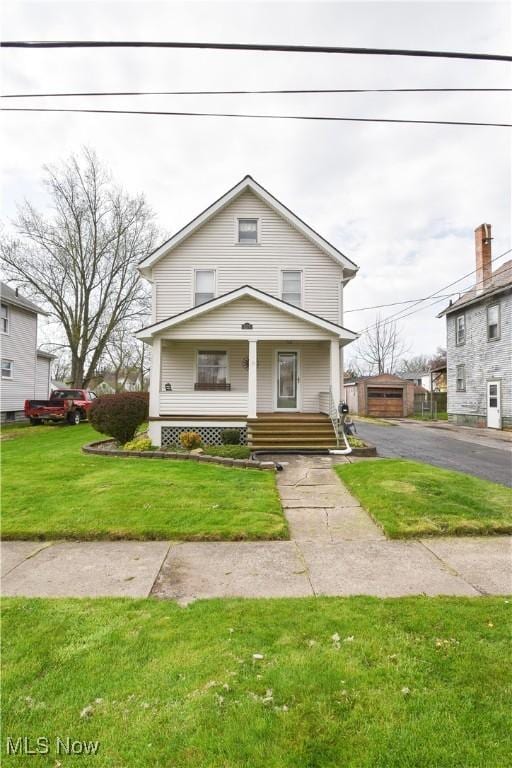 1175 Mcmyler St NW, Warren, OH 44485 - traditional style home featuring covered porch and a front lawn