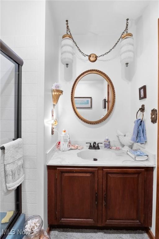 359 Boyce Dr, Chester, WV 26034 - bathroom featuring vanity and a shower with door