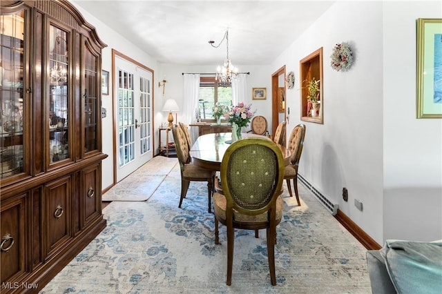 359 Boyce Dr, Chester, WV 26034 - dining room featuring baseboard heating, a chandelier, french doors, and baseboards