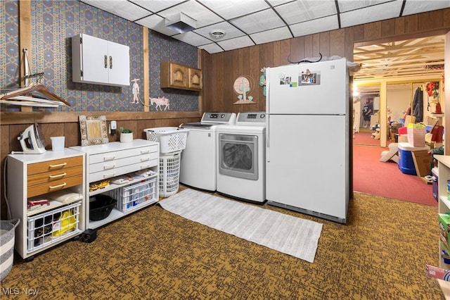 359 Boyce Dr, Chester, WV 26034 - laundry room featuring washing machine and clothes dryer, carpet, and wood walls