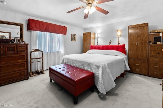 359 Boyce Dr, Chester, WV 26034 - bedroom with light carpet and ceiling fan