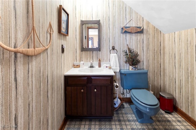 359 Boyce Dr, Chester, WV 26034 - bathroom with wallpapered walls, toilet, vanity, and baseboards