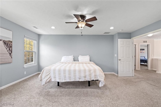 carpeted bedroom featuring baseboards, recessed lighting, and ceiling fan