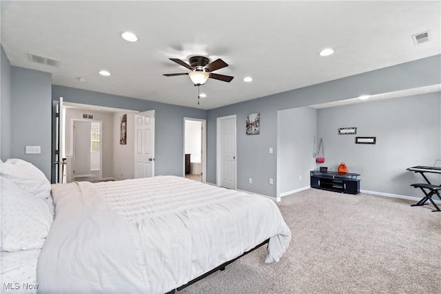 bedroom featuring recessed lighting, carpet flooring, baseboards, ceiling fan, and ensuite bathroom