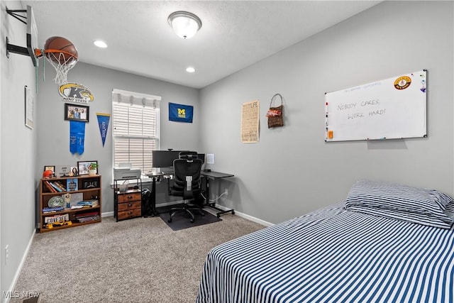carpeted bedroom with baseboards, a desk, and recessed lighting
