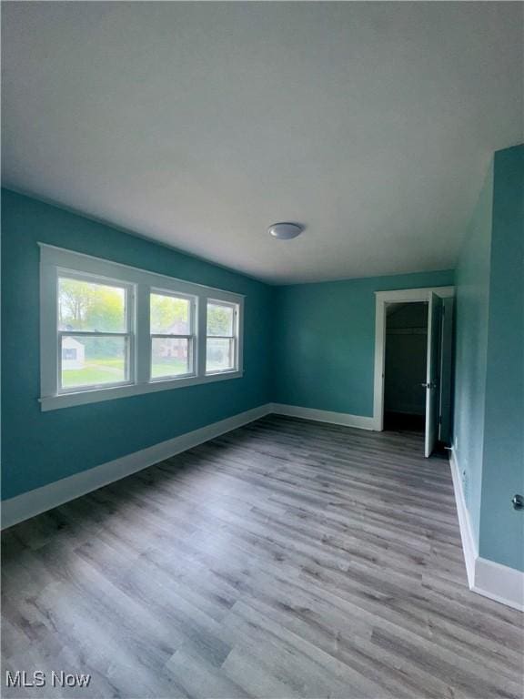 510 Parkcliffe Ave, Youngstown, OH 44511 - spare room with wood finished floors and baseboards