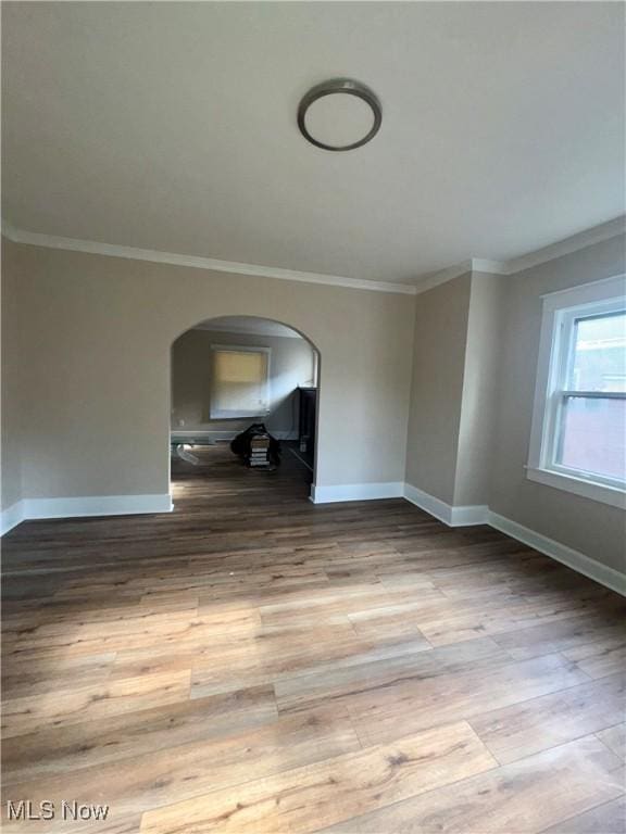 510 Parkcliffe Ave, Youngstown, OH 44511 - unfurnished room featuring ornamental molding, wood finished floors, arched walkways, and baseboards