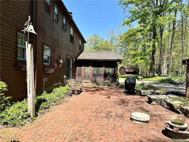 6859 Fairground Blvd, Canfield, OH 44406 - view of patio with a sunroom