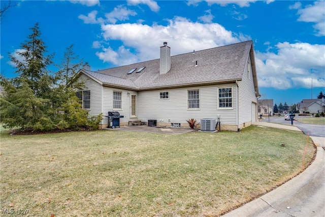 2875 Sherwood Ave NW, Massillon, OH 44646 - rear view of property featuring central AC unit, a chimney, a patio, a lawn, and roof with shingles