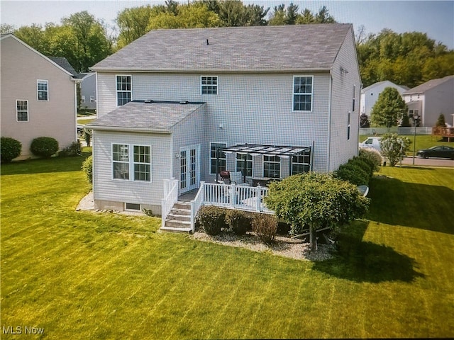 1614 Bellview St NE, Canton, OH 44721 - rear view of property with a wooden deck and a yard