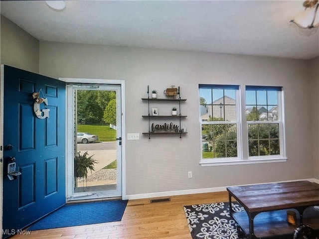 1614 Bellview St NE, Canton, OH 44721 - doorway to outside with wood finished floors and baseboards