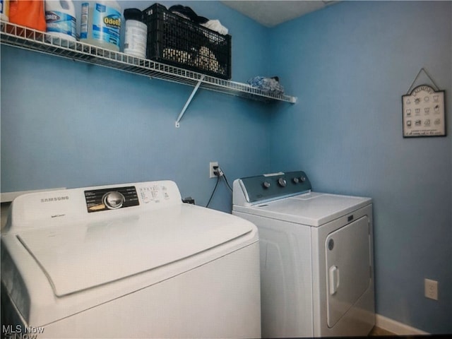 1614 Bellview St NE, Canton, OH 44721 - laundry room featuring washing machine and dryer