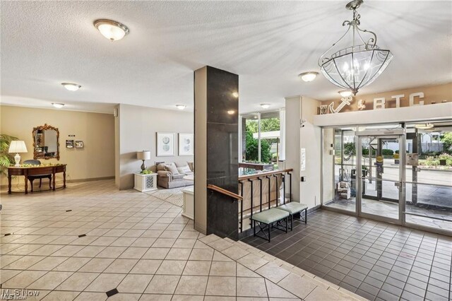 lobby featuring a textured ceiling
