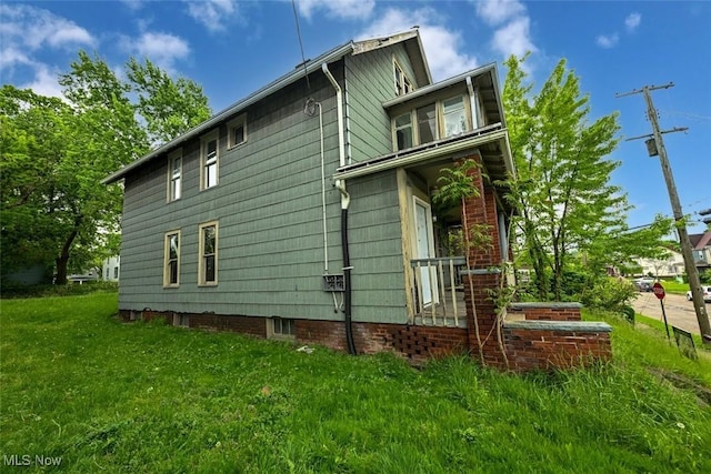 1324-1326 Shorb Ave NW, Canton, OH 44703 - view of property exterior featuring a lawn