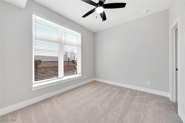 4620 Lorain Ave, Cleveland, OH 44102 - carpeted empty room featuring baseboards and a ceiling fan