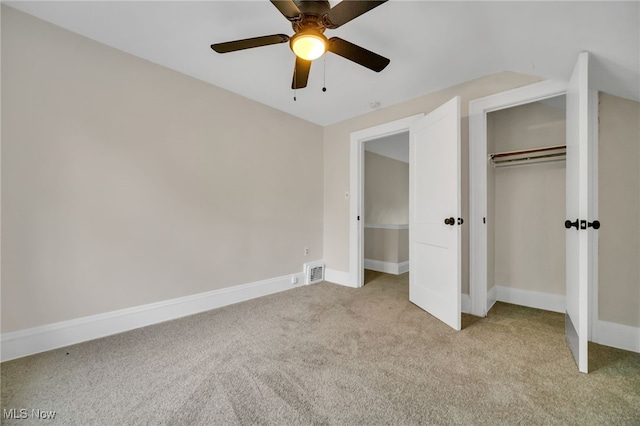 3692 E 118th St, Cleveland, OH 44105 - unfurnished bedroom with light colored carpet, a closet, a ceiling fan, and baseboards