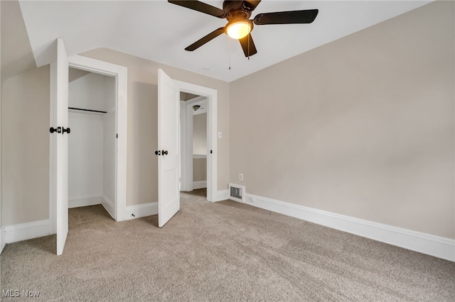 3692 E 118th St, Cleveland, OH 44105 - unfurnished bedroom featuring light carpet, a ceiling fan, and baseboards