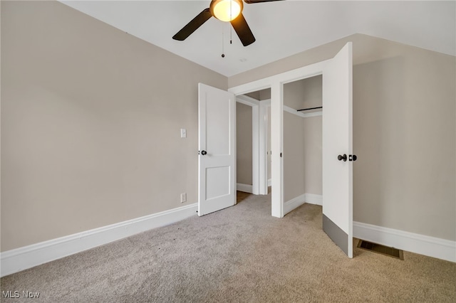 3692 E 118th St, Cleveland, OH 44105 - unfurnished bedroom with light carpet, ceiling fan, a closet, and baseboards
