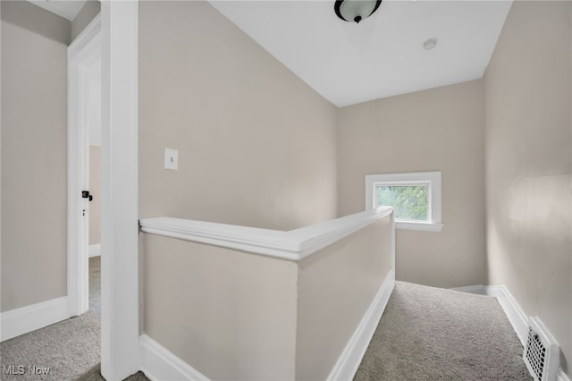 3692 E 118th St, Cleveland, OH 44105 - hallway featuring carpet floors, an upstairs landing, and baseboards