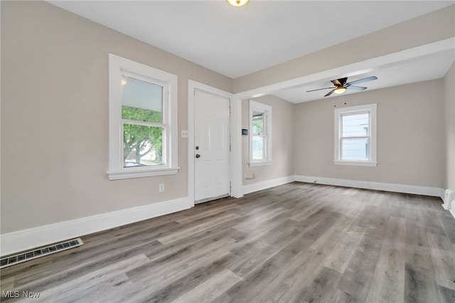 3692 E 118th St, Cleveland, OH 44105 - foyer entrance featuring baseboards, wood finished floors, and a ceiling fan