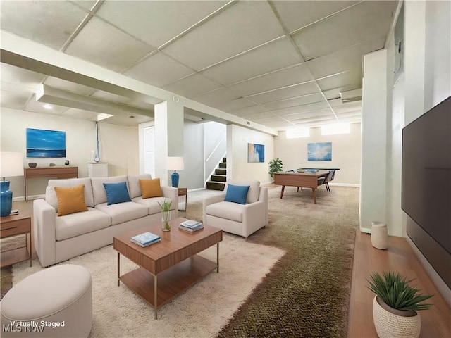 living area with billiards table, stairway, baseboards, and a paneled ceiling