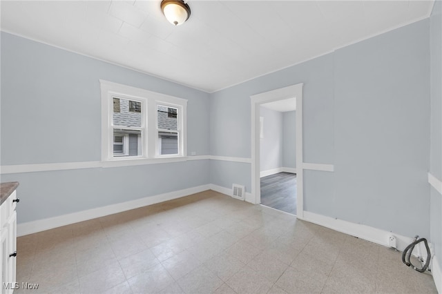 2040 W 103rd St, Cleveland, OH 44102 - spare room with baseboards