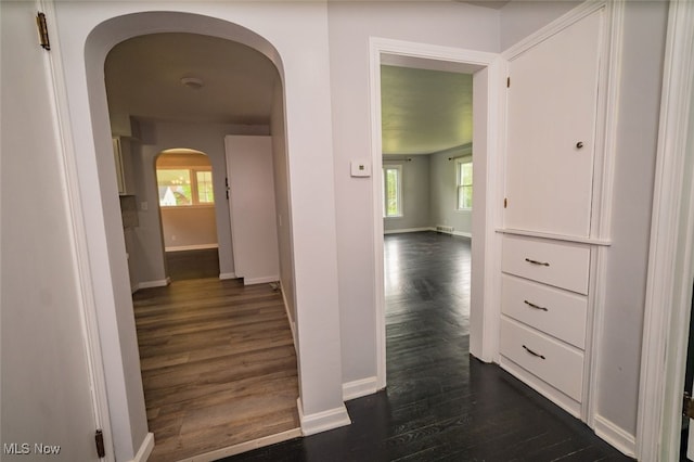 459 N Osborn Ave, Youngstown, OH 44509 - hall featuring arched walkways, dark wood-style floors, and baseboards