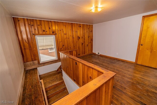 459 N Osborn Ave, Youngstown, OH 44509 - stairway featuring wood finished floors, baseboards, and wood walls