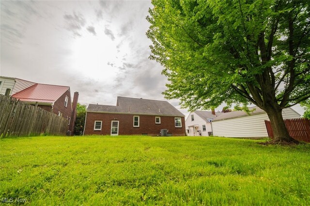 459 N Osborn Ave, Youngstown, OH 44509 - back of property featuring brick siding and central AC unit