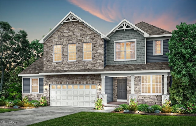 craftsman house featuring stone siding, a garage, and driveway