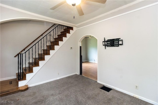 114 Mendel Ct, Elyria, OH 44035 - stairs with arched walkways, a ceiling fan, carpet, baseboards, and ornamental molding
