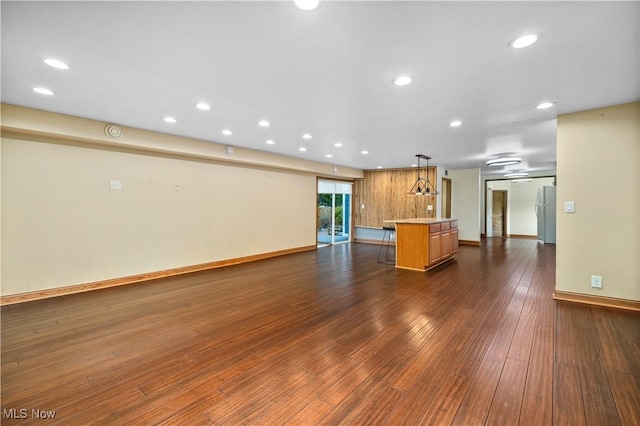 1287 E Garnet Ave, Port Clinton, OH 43452 - kitchen featuring light countertops, open floor plan, dark wood-style flooring, recessed lighting, and baseboards