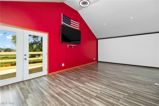 1287 E Garnet Ave, Port Clinton, OH 43452 - bonus room featuring vaulted ceiling, french doors, wood finished floors, and baseboards