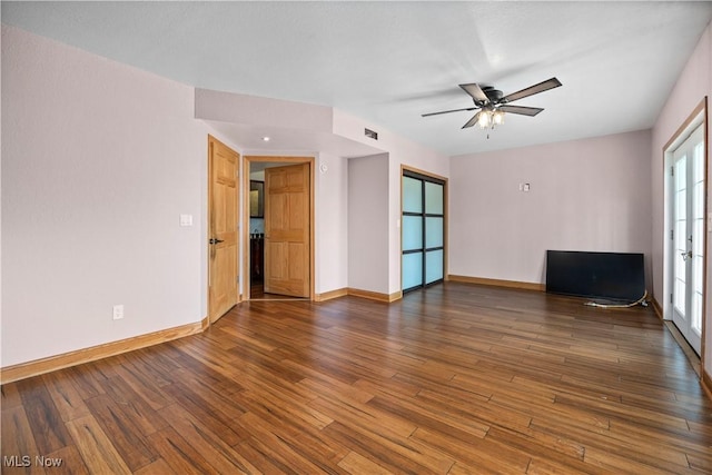 1287 E Garnet Ave, Port Clinton, OH 43452 - spare room featuring baseboards, a ceiling fan, and wood finished floors