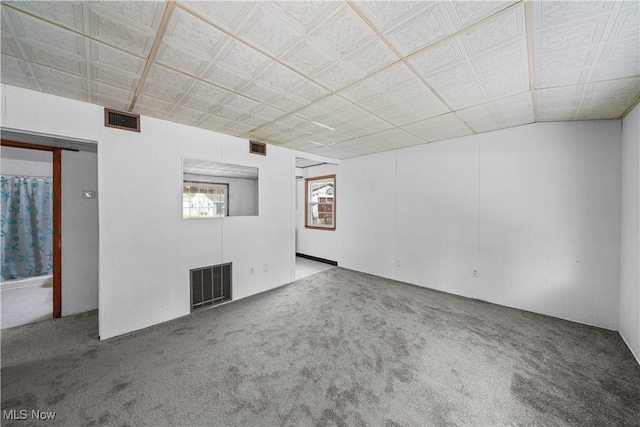 below grade area featuring carpet floors