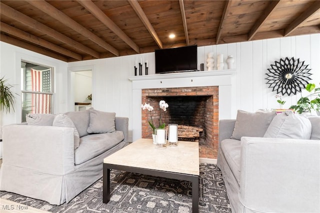675 Wheatfield Dr, Aurora, OH 44202 - living area with wooden ceiling, beam ceiling, and a brick fireplace