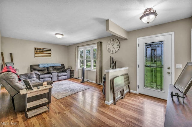 7662 State Rd, Wadsworth, OH 44281 - living area featuring wood finished floors and baseboards