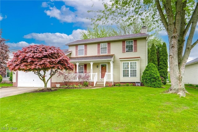 view of front of house with a porch, a chimney, a front yard, a garage, and driveway