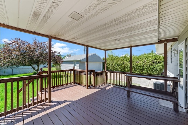 4760 Autumn Ln, Brooklyn, OH 44144 - deck with an outdoor structure, a detached garage, and central AC