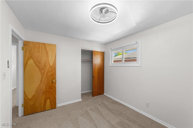 4760 Autumn Ln, Brooklyn, OH 44144 - unfurnished bedroom with a closet, carpet, and baseboards