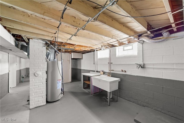 4760 Autumn Ln, Brooklyn, OH 44144 - basement with gas water heater and a sink
