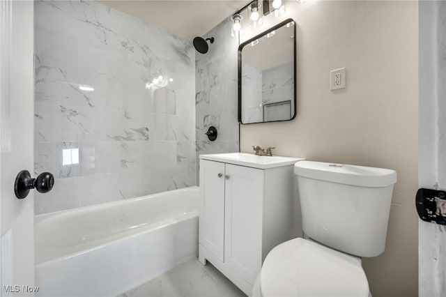 bathroom with marble look tile flooring, toilet, vanity, and washtub / shower combination