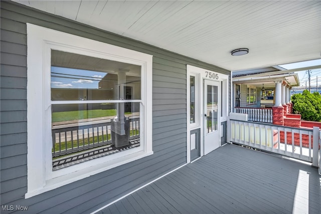 wooden terrace with covered porch