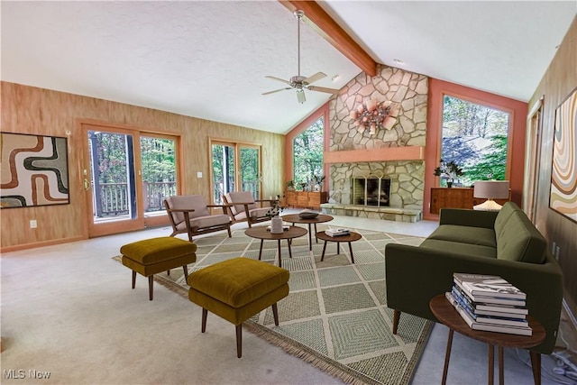 8220 Hermitage Rd, Concord, OH 44077 - living area with plenty of natural light, ceiling fan, wooden walls, and a fireplace