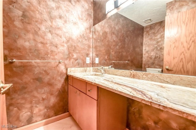 8220 Hermitage Rd, Concord, OH 44077 - bathroom with vanity, toilet, baseboards, and tile patterned flooring