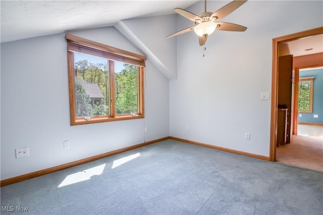 8220 Hermitage Rd, Concord, OH 44077 - carpeted spare room featuring plenty of natural light, a ceiling fan, lofted ceiling, and baseboards