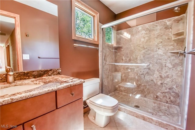8220 Hermitage Rd, Concord, OH 44077 - bathroom with toilet, vanity, tile patterned floors, and a stall shower