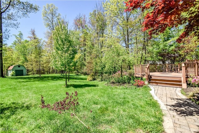 8220 Hermitage Rd, Concord, OH 44077 - view of grassy yard with a deck